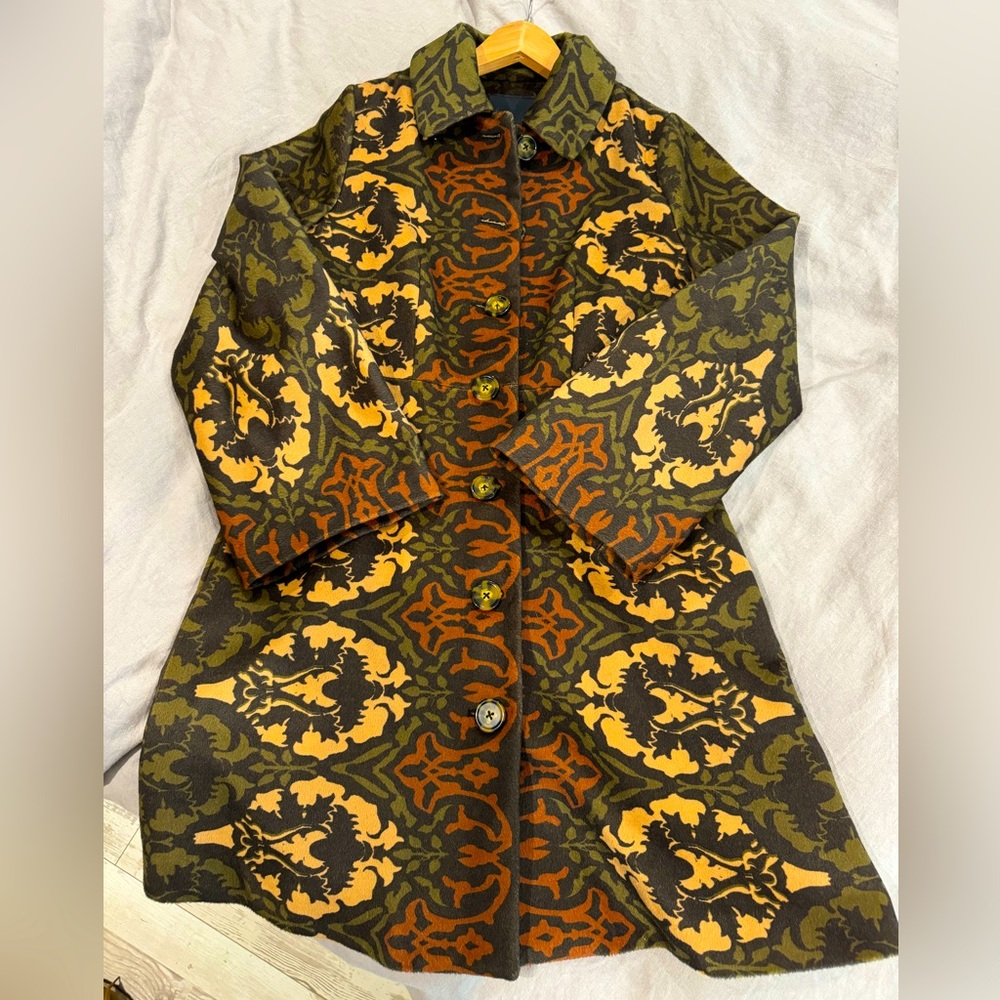 Anthropologie - Mid length button up coat with bell sleeves.